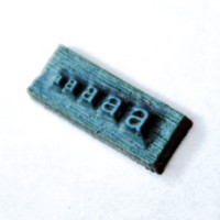 illustration de la gravure de lettres de taille variable sur un tampon